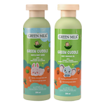 Two bottles of Green Milk Green Cuddle baby products on a white background