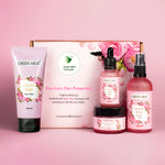 A skincare gift set from Green Milk Concepts, including a face wash, face mist, face serum, and gel cream, all themed with rose colors and packaging.