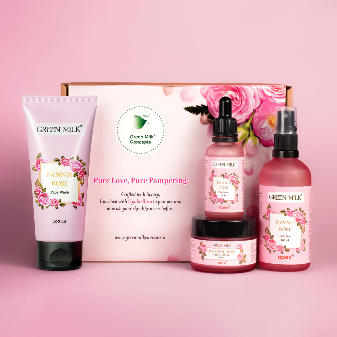 A skincare gift set from Green Milk Concepts, including a face wash, face mist, face serum, and gel cream, all themed with rose colors and packaging.