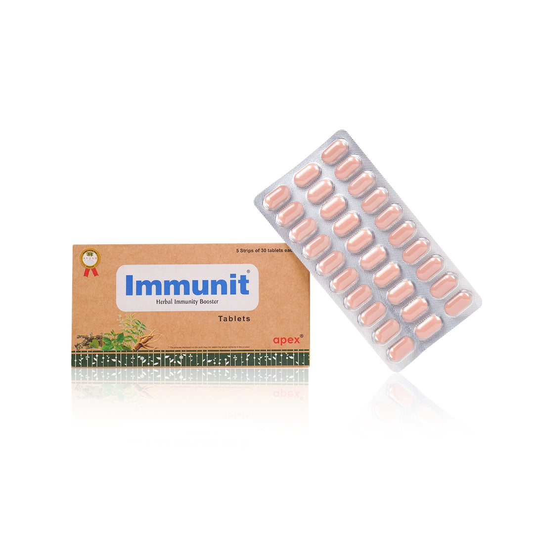 Packaging and blister pack of Immunit tablets, with branding and Ayurvedic herb illustrations.