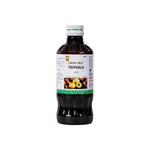 Bottle of Green Milk Triphala syrup on a white background