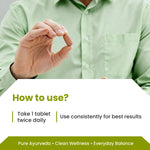 Person holding a transparent tablet with usage instructions on a white background