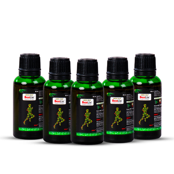 Five green bottles with black caps on a white background