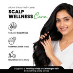 Woman with long black hair touching her scalp, with text about scalp wellness care.
