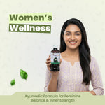 Woman holding a bottle labeled 'Women's Wellness' with text about an Ayurvedic formula.