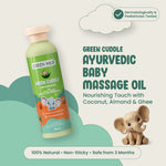 Green Milk Green Cuddle Ayurvedic Baby Massage Oil with a baby elephant toy on a light gray background