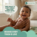 Baby being held with a speech bubble and text about 'Green Cuddle' product, set against a blurred indoor background.