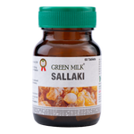 Bottle of Green Milk Sallaki tablets with a green cap on a white background