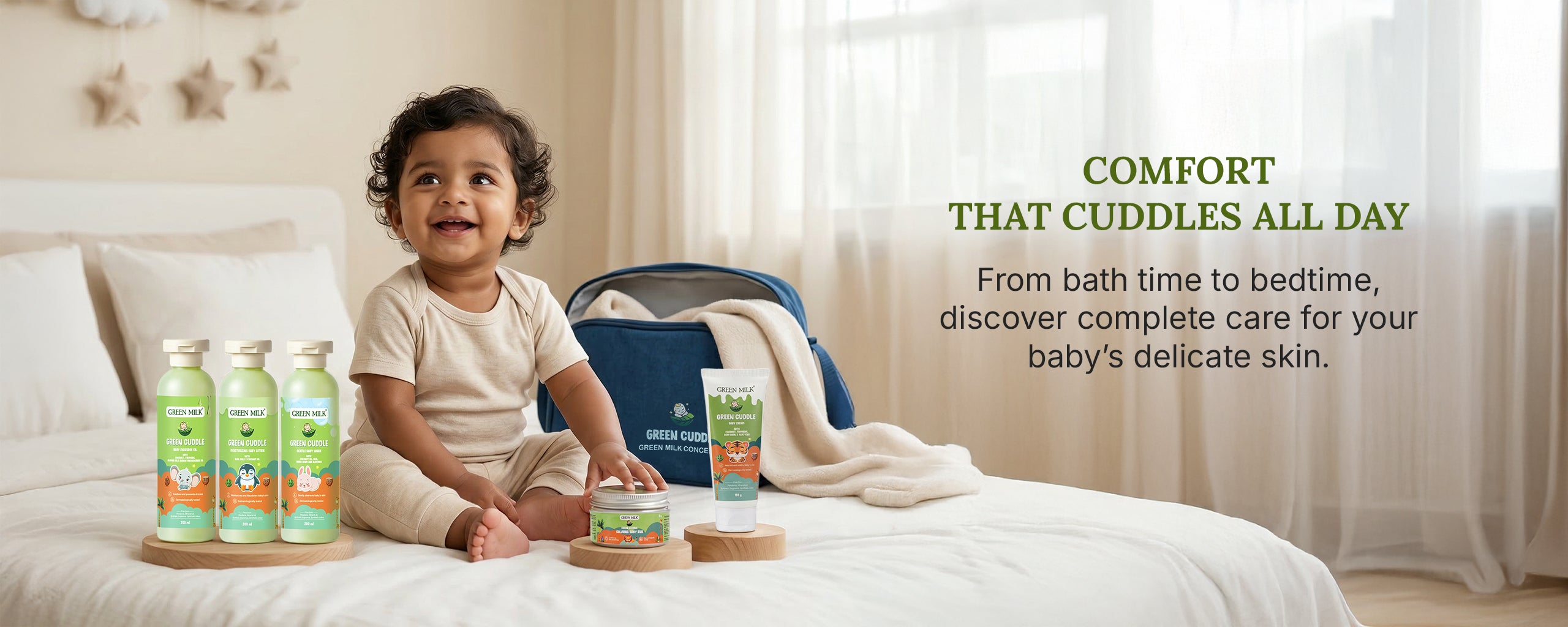 Child sitting on a bed with baby care products, with text about comfort for baby's skin.