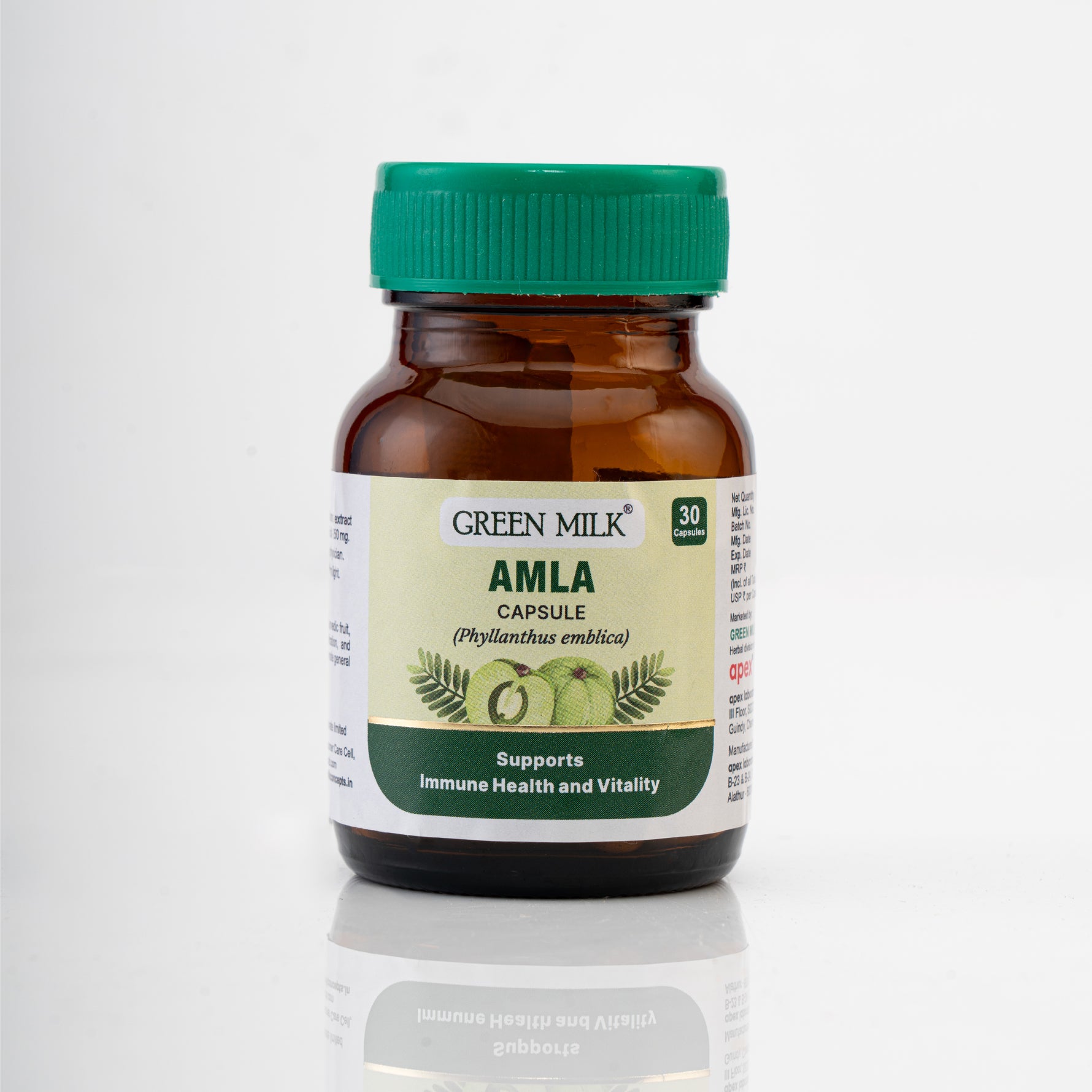 Bottle of Green Milk Amla capsules on a white background
