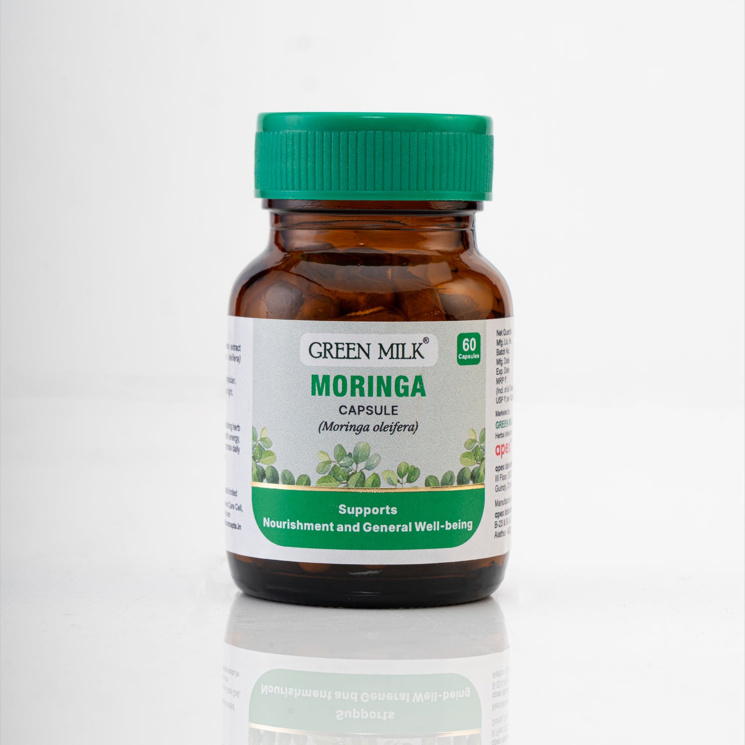 Bottle of Green Milk Moringa capsules on a white background