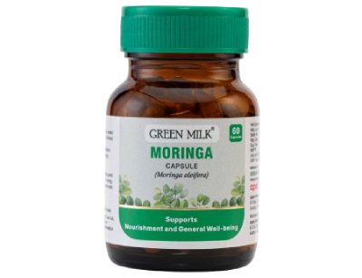 Bottle of Green Milk Moringa capsules on a white background