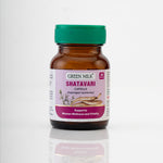 Bottle of Green Milk Shatavari capsules on a white background