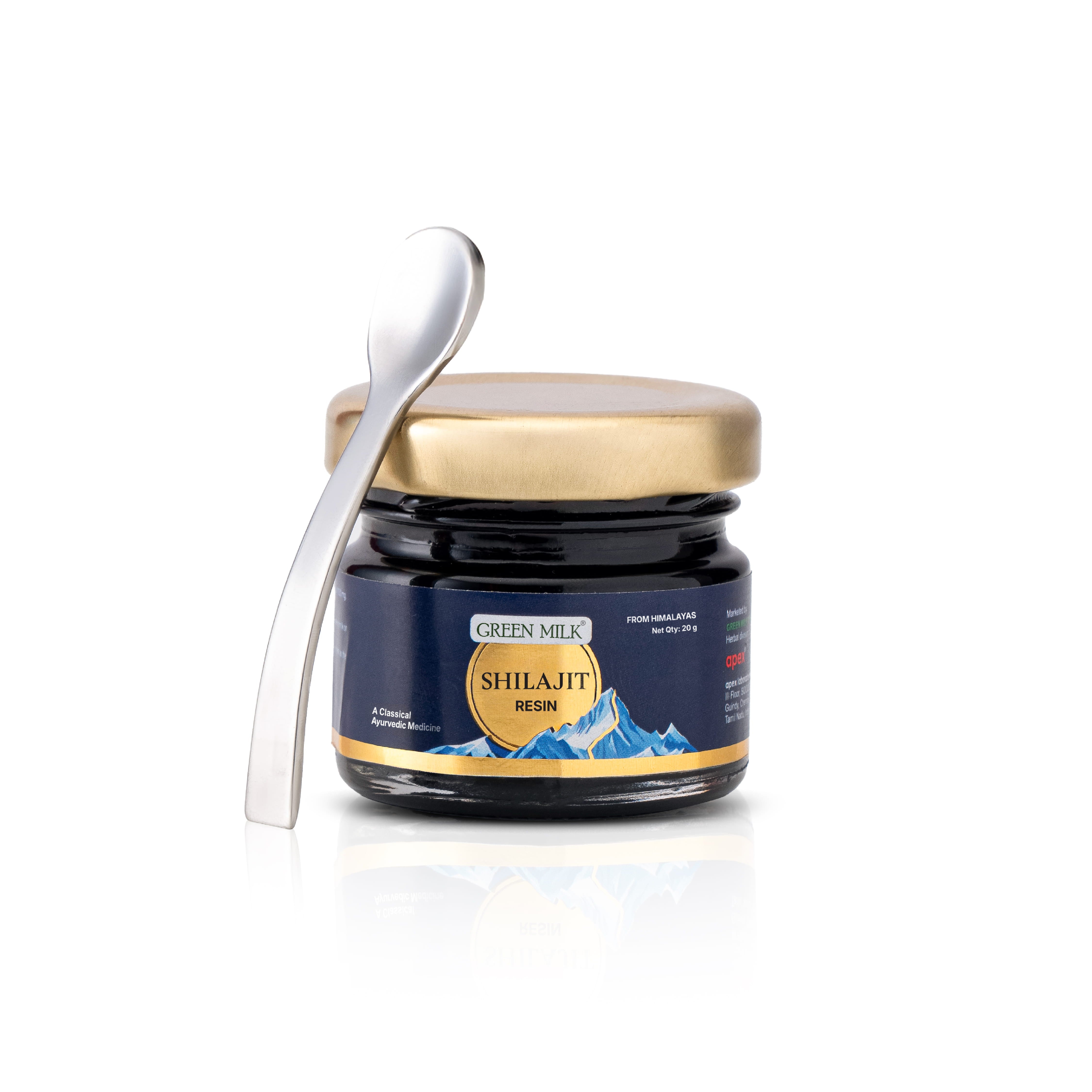 Jar of Shilajit resin with a spoon on a white background
