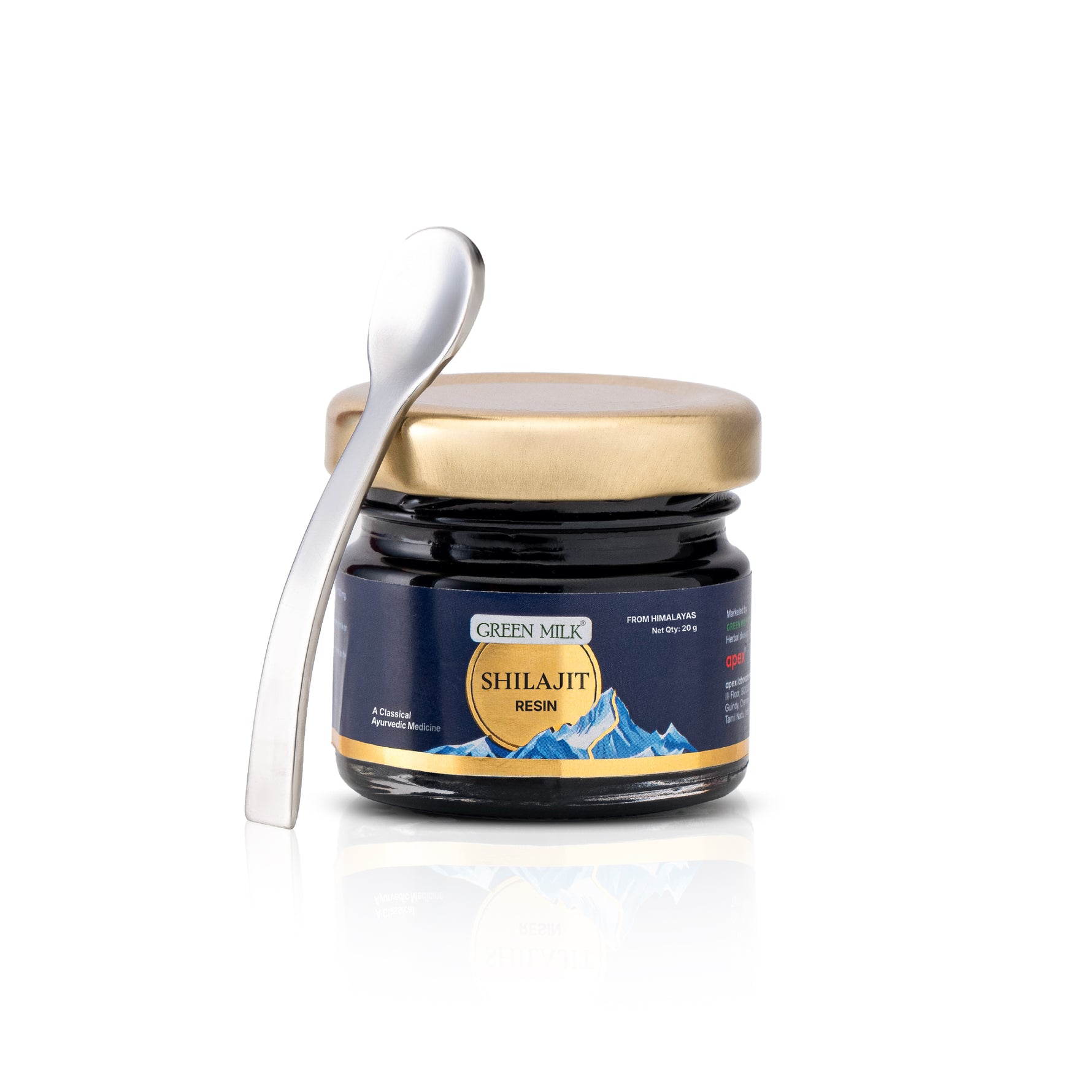 Jar of Shilajit resin with a spoon on a white background