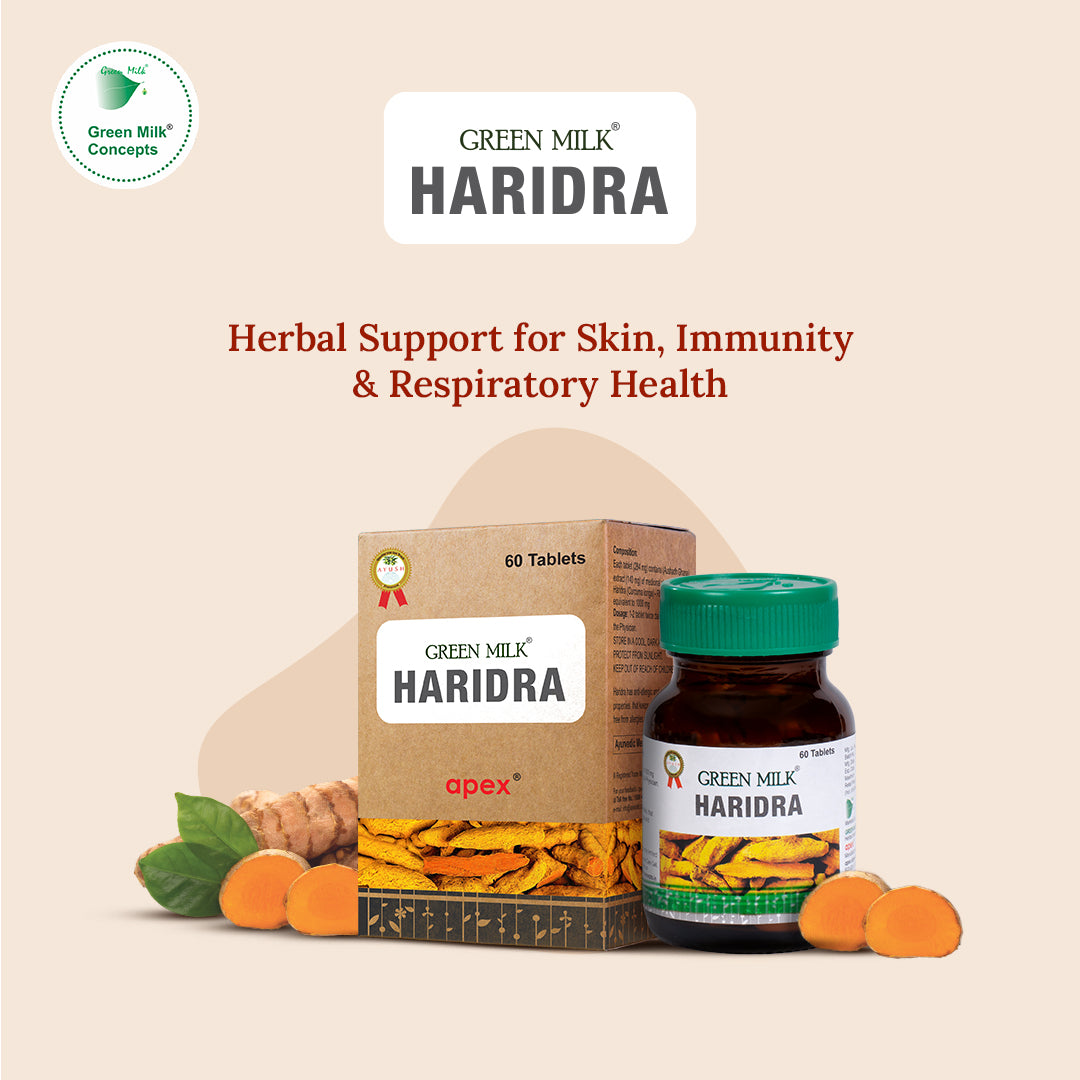 Green Milk Haridra herbal supplement packaging with ingredients on a beige background