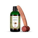 Bottle of Green Milk Manjistha Massage Oil with a wooden massage tool on a white background