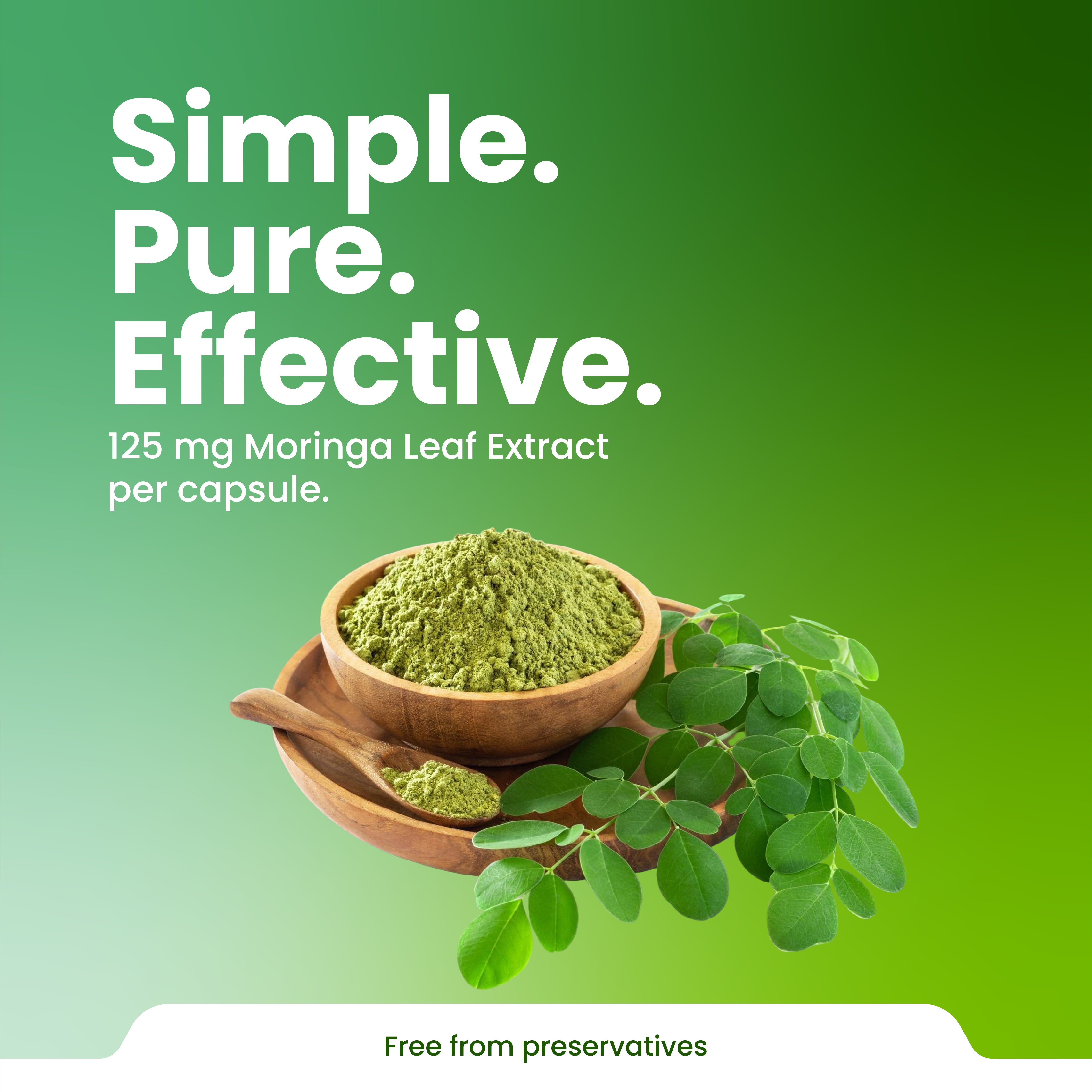 Moringa leaf extract with a wooden bowl and leaves on a green background