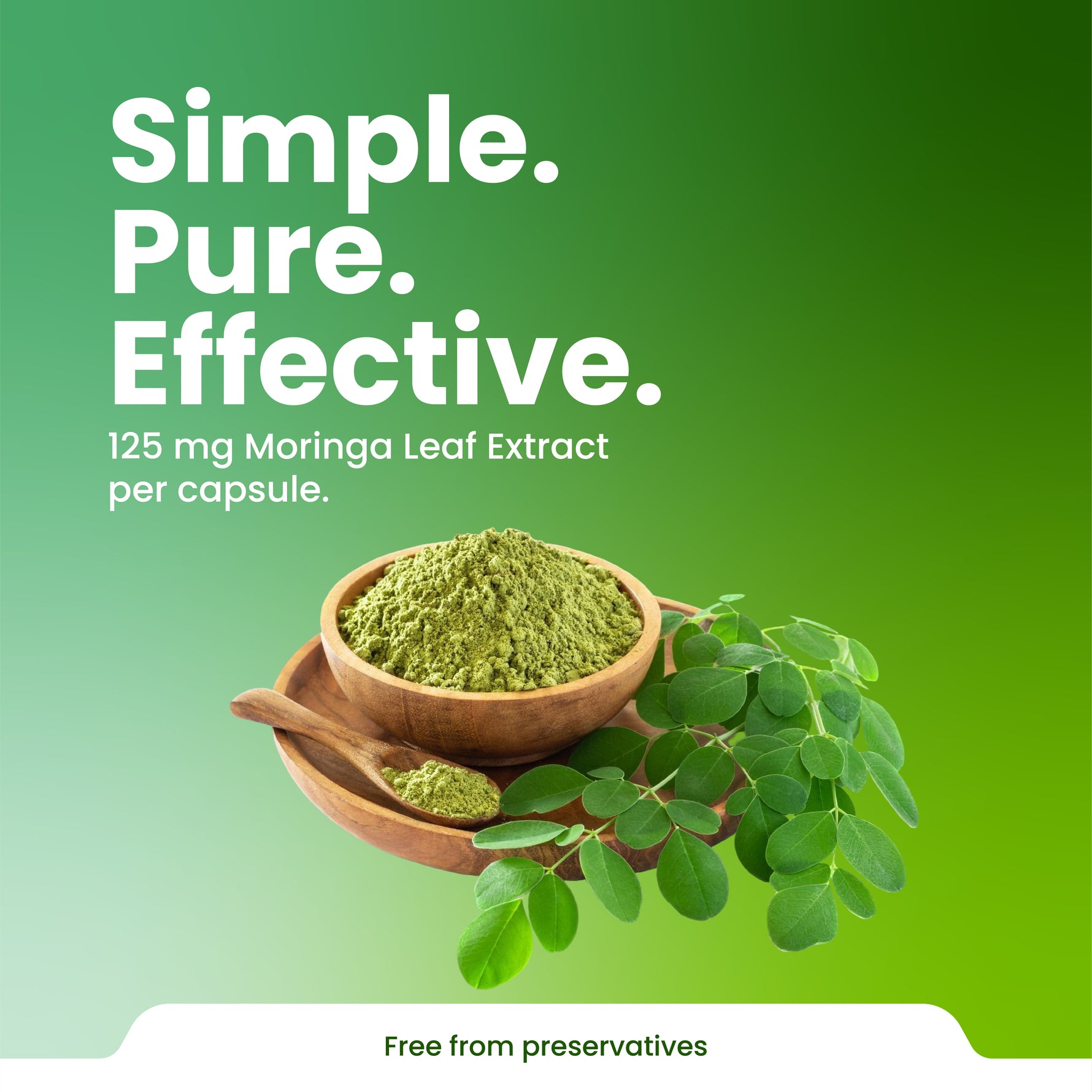Moringa leaf extract with a wooden bowl and leaves on a green background