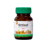 Bottle of Ortiset herbal formula for arthritis with a green cap on a white background