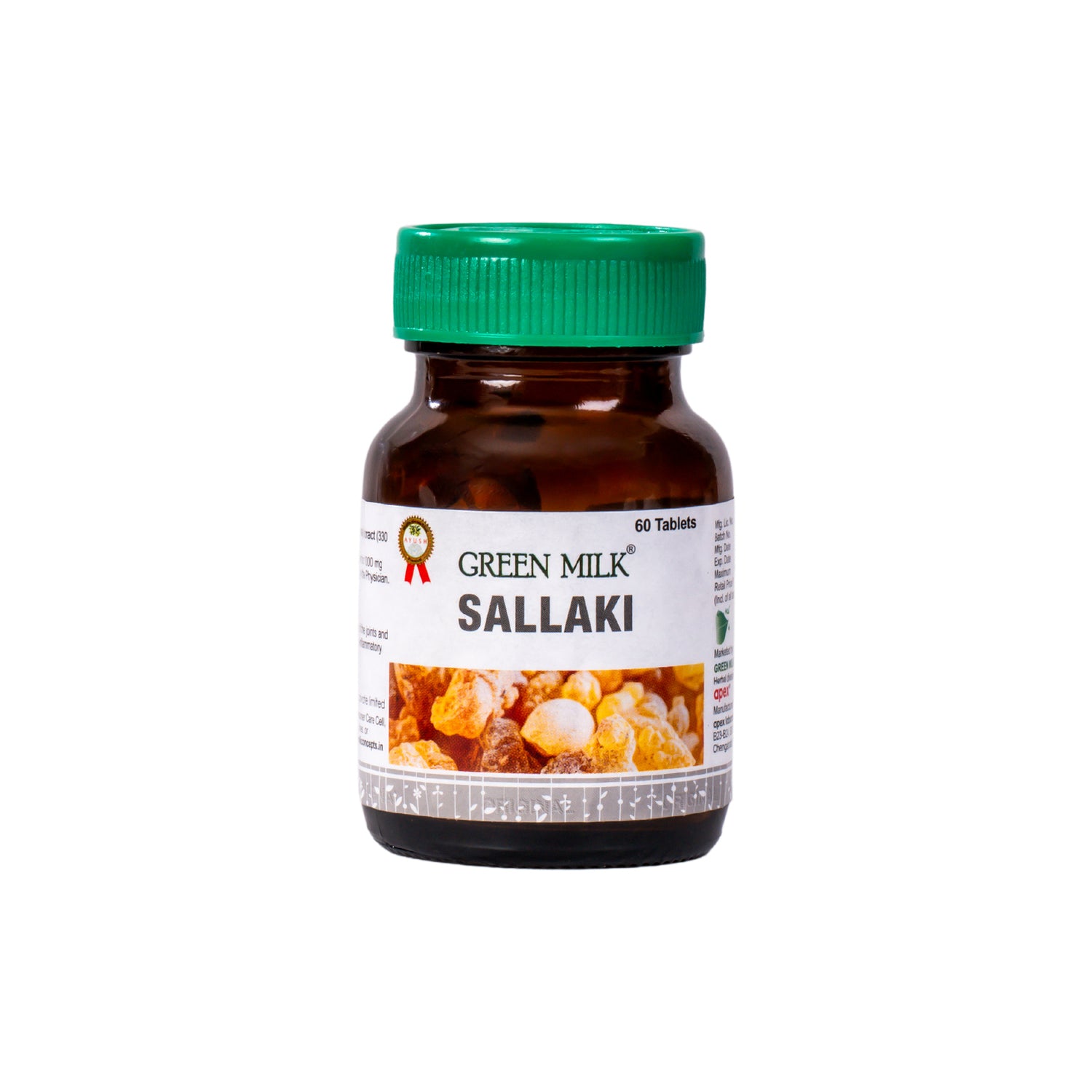 Brown bottle with green cap labeled 'Green Milk Sallaki' on a white background