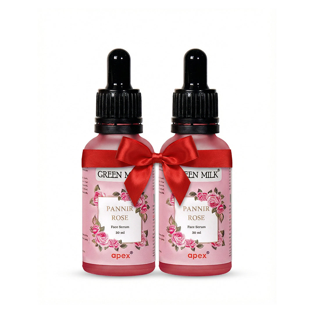 Two bottles of Green Milk Panner Rose Face Serum with red ribbons on a white background