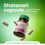 Shatavari capsule bottle with capsules on a green background, promoting women's wellness and vitality support.