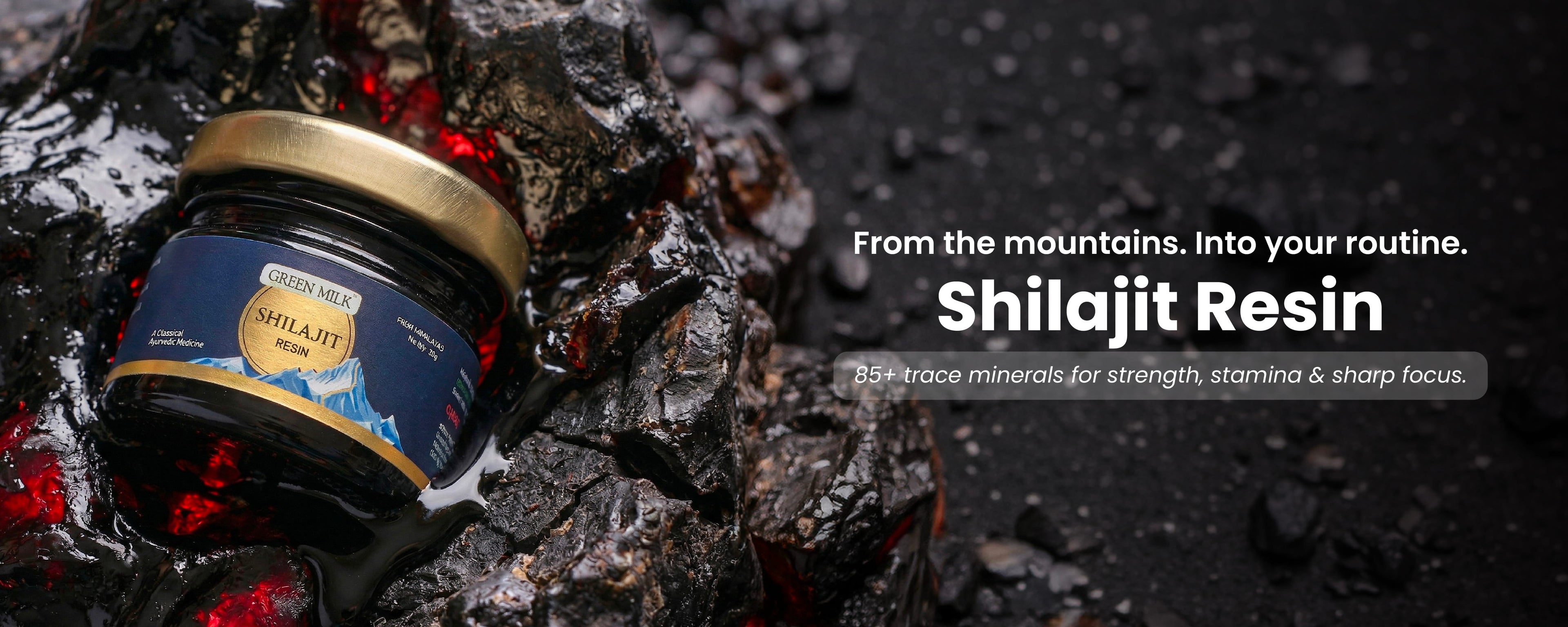 Shilajit resin jar on rocks with promotional text against a dark background
