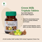 Bottle of Green Milk Triphala Tablets with product details on a beige background
