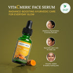 VitaCmeric face serum bottle with benefits on a green background