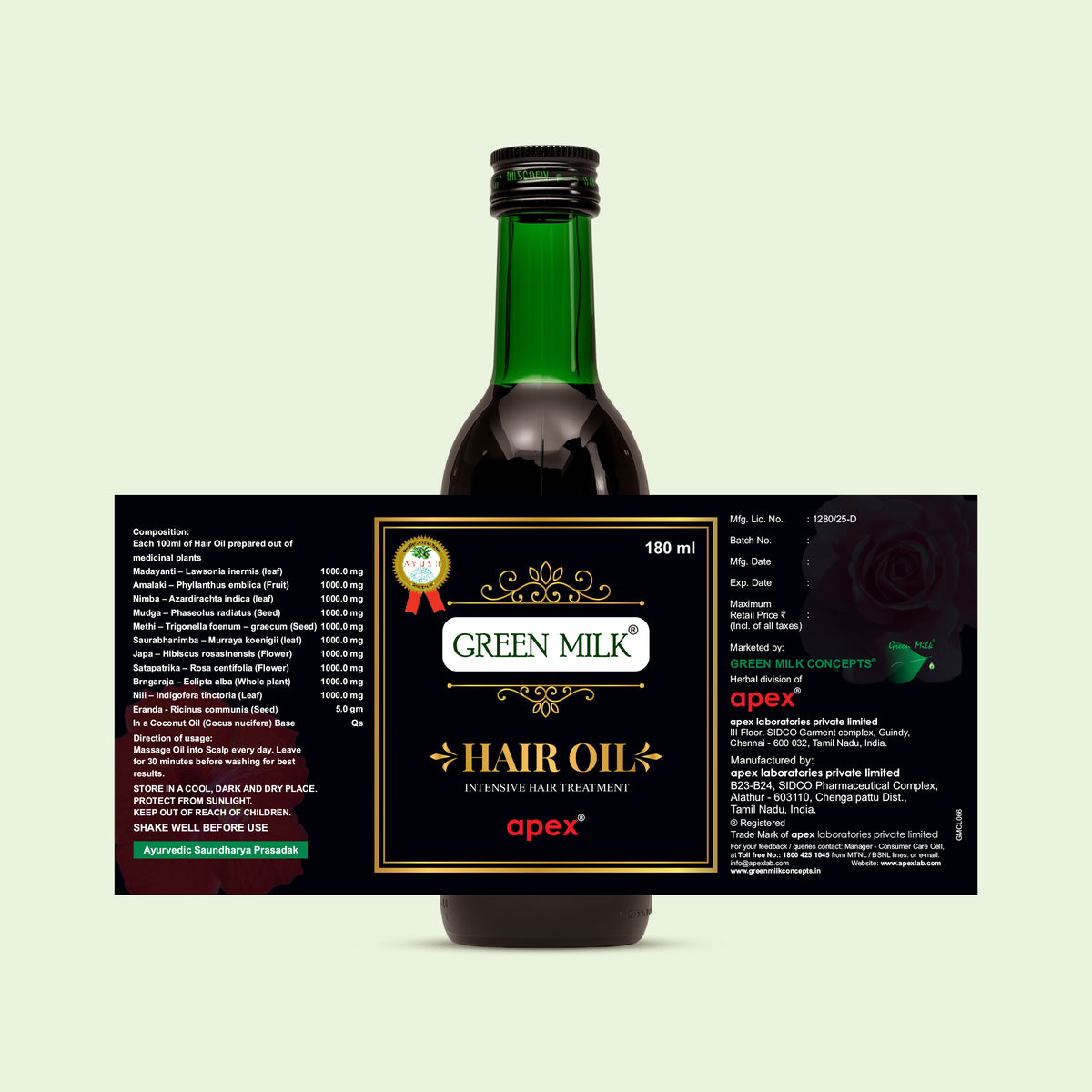 Green Milk Hair Oil bottle with label on a light green background