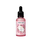 Pink bottle of Green Milk Pannir Rose Face Serum on a white background