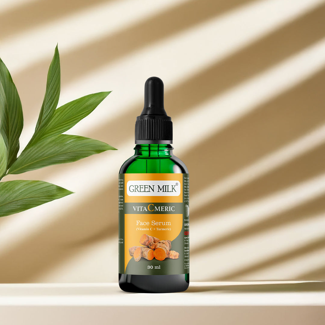 Green Milk VitaCmeric face serum bottle on a beige background with shadows